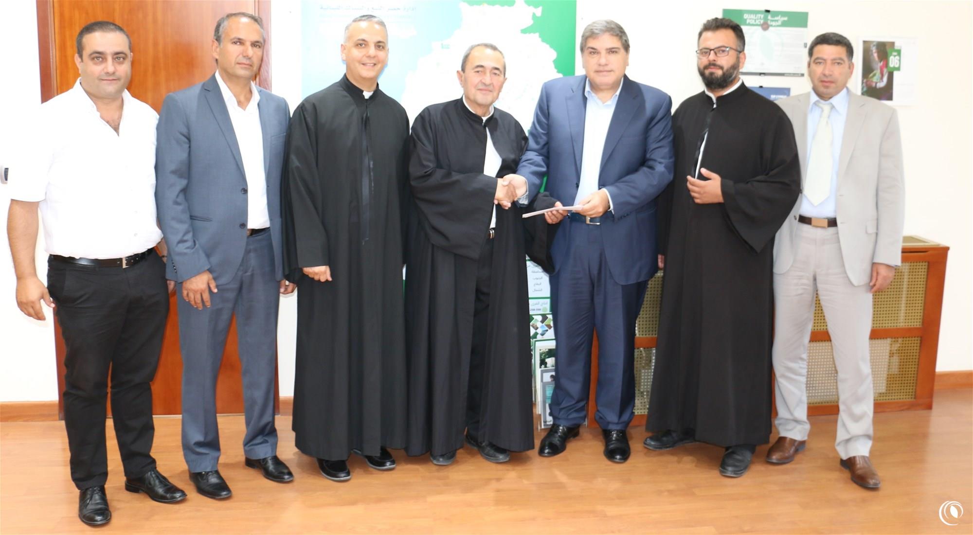 Grant from Regie to build hall for Saint Georges Church in Debl